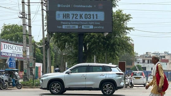 Gurugram, India-August 01, 2026: Gurugram Traffic Police installed a digital display board at Sohna Chowk to help motorists check their e-challans, PUC certificates, and vehicle insurance status near Jail Chowk, August 1, 2026. (Photo by Parveen Kumar/Hindustan Times)