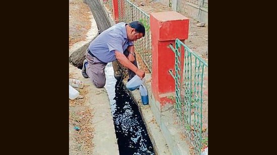 Punjab Pollution Control Board (PPCB) officials reached the spot and collected water samples for testing. (HT Photo)