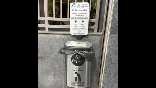 The image shows a touchless bin installed at a station operated by Maha Mumbai Metro.