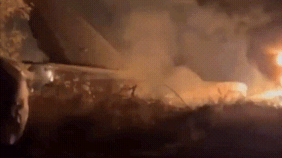 Unverified videos circulating on social media appeared to show flames and thick smoke rising from the crash site. (X/@Osinttechnical)
