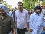 Aam Aadmi Party's Delhi Saurabh Bharadwaj, along with MLA Jarnail Singh and party supporters, outside Delhi Police Headquarters to demand the registration of an FIR against Parvesh Verma.