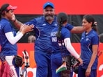 India team members celebrate after winning the compound women's team final in archery between India and China, at the Asian Games in Okazaki