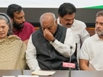 Congress party President Mallikarjun Kharge, center, sits alongside, Congress senior leader Sonia Gandhi, left, and Opposition leader Rahul Gandhi during a news conference following a meeting of the Indian National Developmental Inclusive Alliance, or INDIA, in New Delhi. (AP Photo/Manish Swarup)