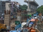 Endless construction activities and poor public transit create a traffic mess, which toll plazas at the city’s perimeters worsen by forcing vehicles to idle for long. (Sanchit Khanna/HT Photo)