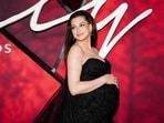 Anne Hathaway arrives on the red carpet for the premiere of Verity. 