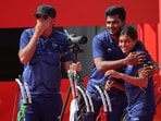 Gold medallists India's Chikitha Taniparthi and Sahil Rajesh Jadhav celebrate after winning the Compound Mixed Team Final 