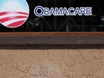 Trump announces $500 Obamacare refund checks for eligible Americans in 30 states. (REUTERS/Mike Blake)