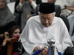 Former Malaysian PM Mahathir Mohamad arrives at the funeral ceremony of his wife Siti Hasmah Mohamad Ali at As Syarif Mosque in Kuala Lumpur on September 28, 2026.