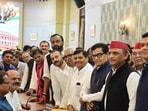 Samajwadi Party candidates for the Rajya Sabha elections, Ram Gopal Yadav and Dhanraj Parimal Nathwani, with party president Akhilesh Yadav and other leaders in Lucknow on Wednesday. (Deepak Gupta/HT Photo)
