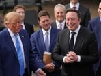 President Donald Trump listens as Elon Musk speaks to reporters at the White House in Washington, Tuesday Sept. 29, 2026, after meeting with top executives of AI firms.