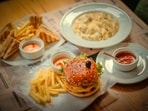 Here's what happens to your heart when you indulge in cheat meals after eating healthy all week.
