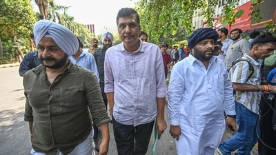 Aam Aadmi Party's Delhi Saurabh Bharadwaj, along with MLA Jarnail Singh and party supporters, outside Delhi Police Headquarters to demand the registration of an FIR against Parvesh Verma. (Sanchit Khanna/ HT Photo) Aam Aadmi Party's Delhi Saurabh Bharadwaj, along with MLA Jarnail Singh and party supporters, outside Delhi Police Headquarters to demand the registration of an FIR against Parvesh Verma. (Sanchit Khanna/ HT Photo)
