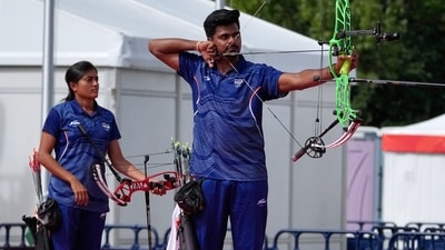 India's Sahil Rajesh Jadhav, right, and Chikitha Taniparthi compete in the compound mixed team final in archery between India and South Korea (AP Photo/Eugene Hoshiko) India's Sahil Rajesh Jadhav, right, and Chikitha Taniparthi compete in the compound mixed team final in archery between India and South Korea (AP Photo/Eugene Hoshiko)