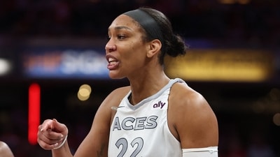 A'ja Wilson received a technical foul after leaving the court to confront the fan. (Getty Images via AFP) A'ja Wilson received a technical foul after leaving the court to confront the fan. (Getty Images via AFP)
