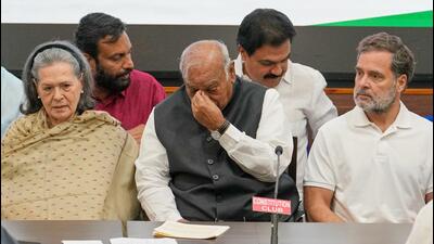 Congress party President Mallikarjun Kharge, center, sits alongside, Congress senior leader Sonia Gandhi, left, and Opposition leader Rahul Gandhi during a news conference following a meeting of the Indian National Developmental Inclusive Alliance, or INDIA, in New Delhi. (AP Photo/Manish Swarup)