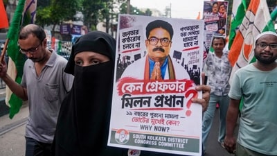 Congress party workers participate in a protest rally against the arrest of Milan Pradhan in Kolkata. (PTI)