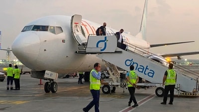 Israeli tourists leave a FlyDubai plane which departed from Ben-Gurion International Airport in Tel Aviv and landed in Dubai, United Arab Emirates. (AP )