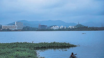 Mumbai, India - August 29, 2021: A fisherman waiting in the waters for his daily catch in Powai Lake, Mumbai, India, on Sunday, August 29, 2021. (Photo by Pratik Chorge/Hindustan Times) (Pratik Chorge/HT PHOTO) Mumbai, India - August 29, 2021: A fisherman waiting in the waters for his daily catch in Powai Lake, Mumbai, India, on Sunday, August 29, 2021. (Photo by Pratik Chorge/Hindustan Times) (Pratik Chorge/HT PHOTO)