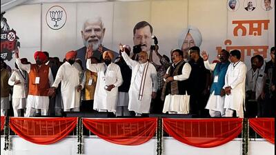 Union home minister Amit Shah and Punjab BJP chief Kewal Singh Dhillon along with party leaders at the rally in Jalandhar on Wednesday. (HT Photo) Union home minister Amit Shah and Punjab BJP chief Kewal Singh Dhillon along with party leaders at the rally in Jalandhar on Wednesday. (HT Photo)