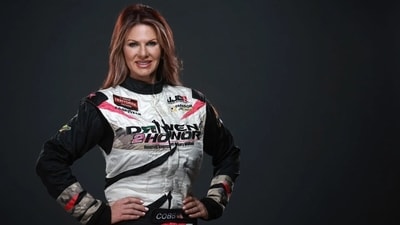 NASCAR driver Jennifer Jo Cobb has been asked to pay $850K to a woman for an alleged affair with her husband. (X/@911NewsBreaks)