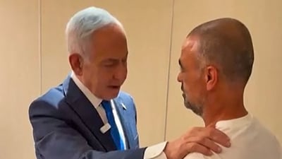 This screen grab taken from video footage released by the Israeli Prime Minister's Office shows Israel's Prime Minister Benjamin Netanyahu (L) meeting a man named Yaniv, describing him as one of the passengers who managed to break into the flydubai aircraft's cockpit. (AFP) This screen grab taken from video footage released by the Israeli Prime Minister's Office shows Israel's Prime Minister Benjamin Netanyahu (L) meeting a man named Yaniv, describing him as one of the passengers who managed to break into the flydubai aircraft's cockpit. (AFP)
