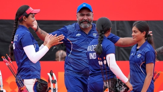 India team members celebrate after winning the compound women's team final in archery between India and China, at the Asian Games in Okazaki (AP Photo/Eugene Hoshiko)