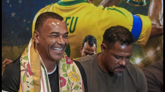Brazilian former footballer Cafu, left, with Brazilian former striker Jose Ramirez Barreto during an interactive session at the BNCCI, in Kolkata. (PTI)