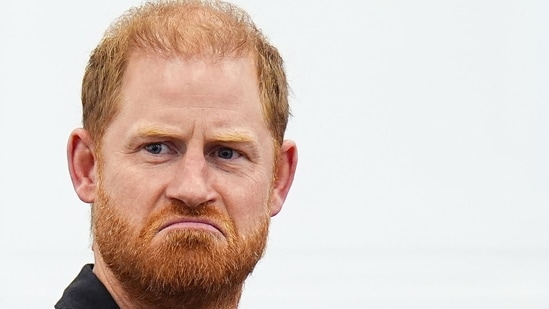 Britain's Prince Harry, Duke of Sussex reacts during a panel discussion during his visit to Ninestiles School, in Birmingham, central England on September 18, 2026, as part of the launch of the INSPIRE education programme ahead of the Invictus Games in Birmingham in 2027.