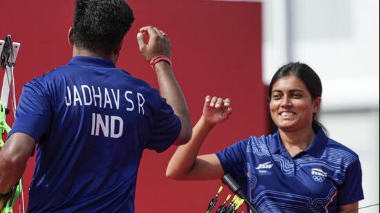 India's Sahil Jadhav and Chikitha Taniparthi celebrate after the compound mixed team archery gold medal match. (PTI)