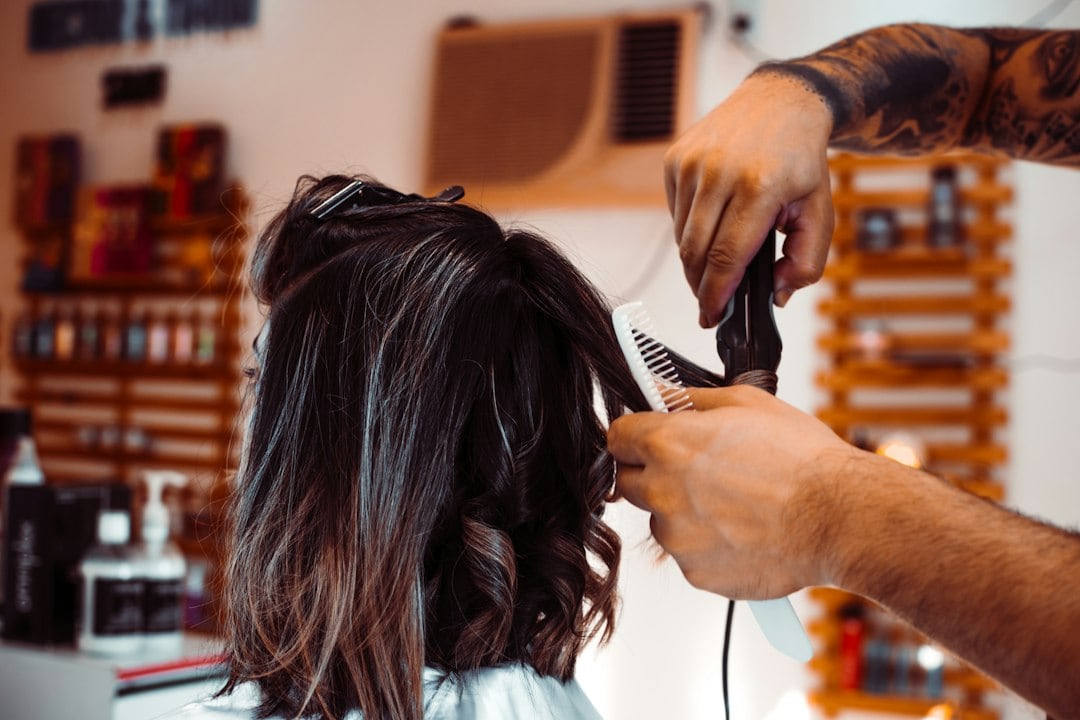 If you need a regular haircut or trim, a reasonable time would be five to seven days before the event. (Unsplash)