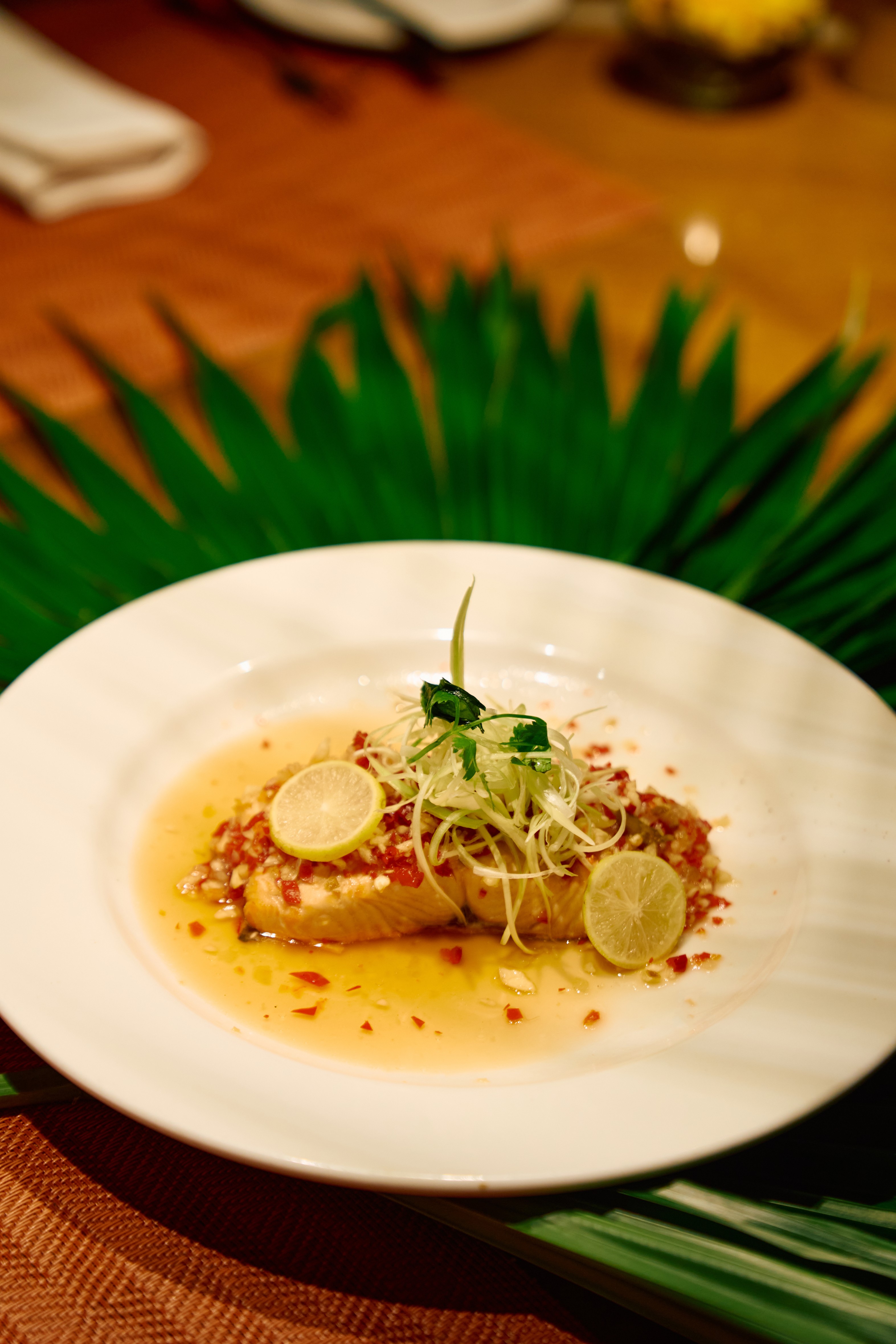 Pla Neung Manao—steamed sole fish with chilli sauce.