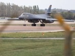 A B‑1B Lancer bomber arrives at RAF Fairford airbase, after police declared a major incident at the base and arrested several men on suspicion of offences under the Explosives Act, who have since been released on bail