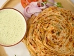 Kunal Kapur’s chilli-garlic laccha paratha with chutney raita takes 35 minutes to make.(chefkunalkapur.com)
