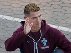 Cristiano Ronaldo waves to fans as he arrives for a training session at Parken stadium in Copenhagen, Denmark, on September 30, 2026, on the eve of their Nations League Group A4 match against Denmark