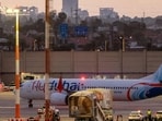 A flydubai Boeing 737 MAX 8 aircraft is pictured on the tarmac after landing at Israel's Ben Gurion Airport in Lod on September 30, 2026. 