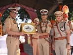 HPA director general of police Kala Ramachandran delivered the welcome address and presented Jain with a memento. (HT Photo)