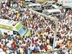Hundreds of supporters of Pradeep Purnekar gathered outside the Kapurbawdi police station on Wednesday, demanding action against the accused.