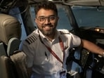 Indian pilot Smit Machchhar, whom the leaders of Israel and India hailed as a hero for saving passengers ' lives, smiles in an unidentified location in this undated handout image.