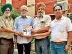 Jatinder Pannu (second from left) and others after the book launch ceremony in Ludhiana on Thursday. (Manish/HT)