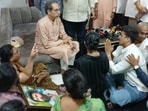 Shiv Sena (UBT) chief Uddhav Thackeray reached out to Pradeep Purnekar’s family in Thane following the party leader’s murder, and assured the grieving family of his complete support (HT Photo/Praful Gangurde)