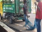 The LMC squad catching a stray dog on the PGI campus. (Sourced)