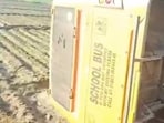 The bus that overturned into a field near Muradpur village in Hoshiarpur district on Thursday.