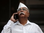 A man looks at a screen outside the Bombay Stock Exchange (BSE) building in Mumbai(Reuters File)