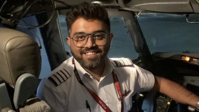 Indian pilot Smit Machchhar, whom the leaders of Israel and India hailed as a hero for saving passengers ' lives, smiles in an unidentified location in this undated handout image. (Israel Foreign Ministry/REUTERS)