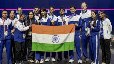 Nagoya: India’s Anahat Singh, Abhay Singh, Joshna Chinnapa, Velavan Senthilkumar and others pose for photographs after winning silver medal and Bronze medals in the women’s, men's singles and mixed doubles Squash events in the ongoing 20th Asian Games, in Nagoya, Japan, Sunday, Sept. 27, 2026. (PTI Photo/Arun Sharma)(PTI09_27_2026_000228A) (PTI) Nagoya: India’s Anahat Singh, Abhay Singh, Joshna Chinnapa, Velavan Senthilkumar and others pose for photographs after winning silver medal and Bronze medals in the women’s, men's singles and mixed doubles Squash events in the ongoing 20th Asian Games, in Nagoya, Japan, Sunday, Sept. 27, 2026. (PTI Photo/Arun Sharma)(PTI09_27_2026_000228A) (PTI)