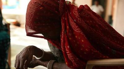 The woman alleged that a group of villagers barged into her house when her husband and son were not at home.