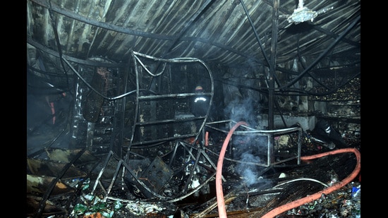 A quick commerce company’s godown in Niti Khand, Indirapuram, where fire broke out on Thursday. (Sakib Ali / Hindustan Times)