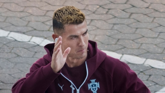 Cristiano Ronaldo waves to fans as he arrives for a training session at Parken stadium in Copenhagen, Denmark, on September 30, 2026, on the eve of their Nations League Group A4 match against Denmark