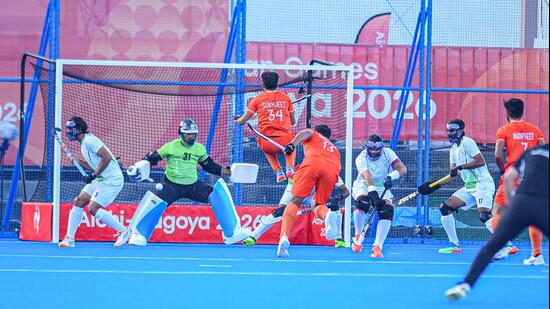 Harmanpreet Singh scores the opening goal for India against Pakistan in the Asian Games hockey semi-final. (AHF)