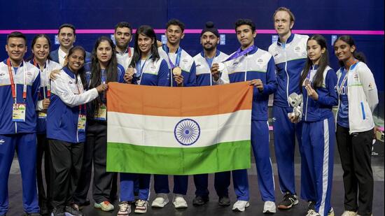 Nagoya: India’s Anahat Singh, Abhay Singh, Joshna Chinnapa, Velavan Senthilkumar and others pose for photographs after winning silver medal and Bronze medals in the women’s, men's singles and mixed doubles Squash events in the ongoing 20th Asian Games, in Nagoya, Japan, Sunday, Sept. 27, 2026. (PTI Photo/Arun Sharma)(PTI09_27_2026_000228A) (PTI)